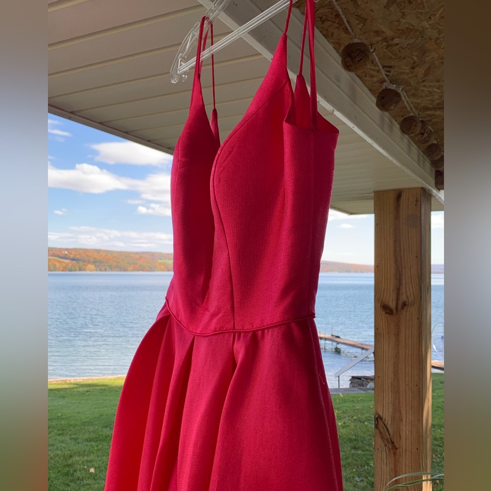 Never worn, still in plastic, prom/ wedding dress. Un- altered. Beautiful gown